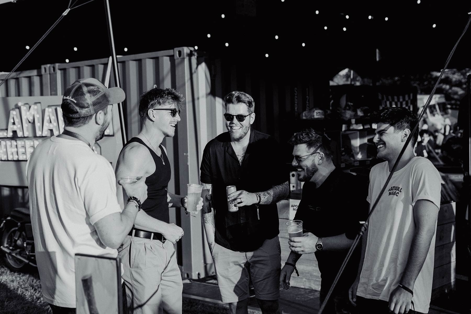 The Ellusionist team discussing magic at a table