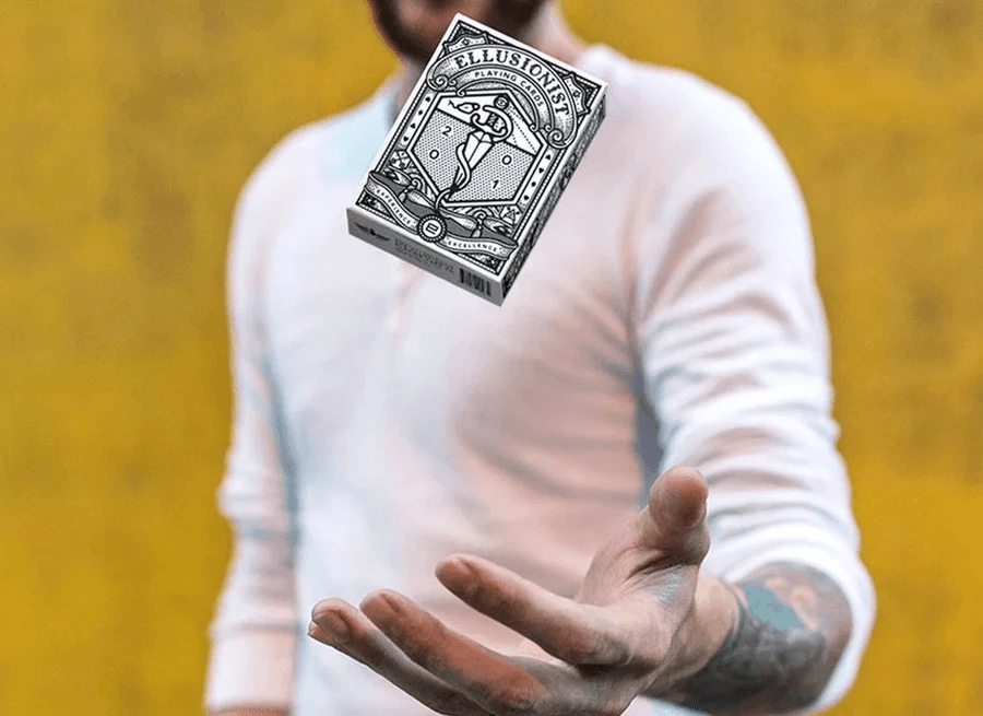 Magician levitating an Ellusionist playing card box